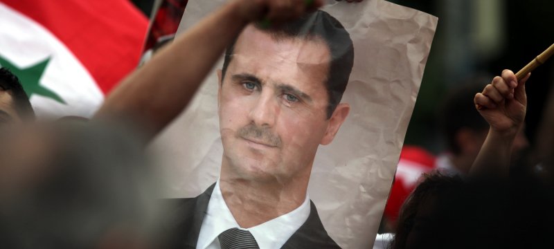 Bild von Baschar al-Assad auf einer Syrien-Demonstration